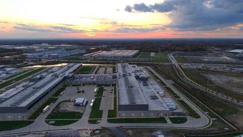 Expansive aerial view orbiting around a large, modern data center complex a.. Stock-Footage 333601764