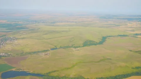 Expansive aerial view of patchwork farmland fields stretching across the ho.. Stock Footage 293087365