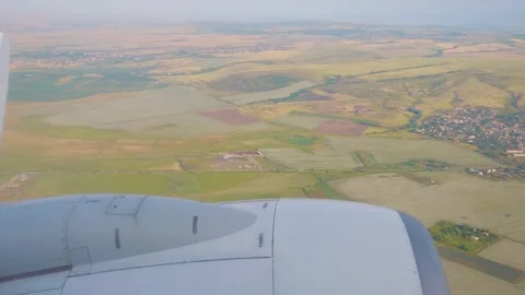 Expansive aerial view of patchwork farmland fields stretching across the ho.. Stock Footage 293087368