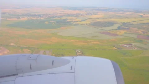 Expansive aerial view of patchwork farmland fields stretching across the ho.. Stock Footage 293087377