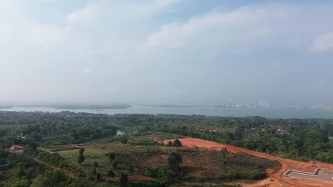Expansive aerial view showcasing environmental change, pristine woodlands. Stock Footage 319459497