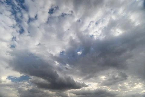 Expansive atmospheric ceiling featuring different cloud formations and patt.. 写真素材