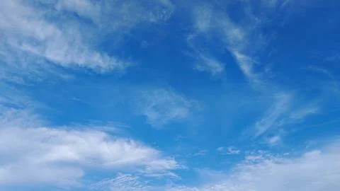 Expansive Blue Sky with Dynamic Cloud Formations Stock Photos