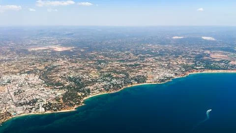 Expansive coastal view with sprawling development Stock Photos