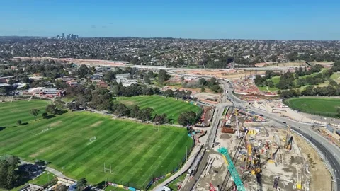 Expansive construction and sports fields at Bulleen Interchange of North Ea.. Stock Footage 282087225