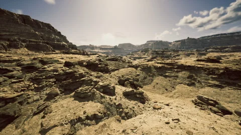 Expansive daylight filled chasm with irregular ledges and distant horizons Stock Footage 335101744