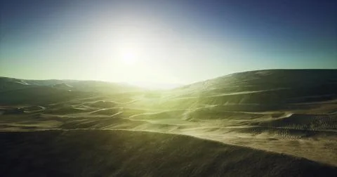 Expansive desert landscape under bright sun at golden hour Stock Illustration