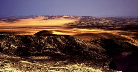 Expansive desert landscape under a sunset with deep shadows and golden hues Stock Illustration