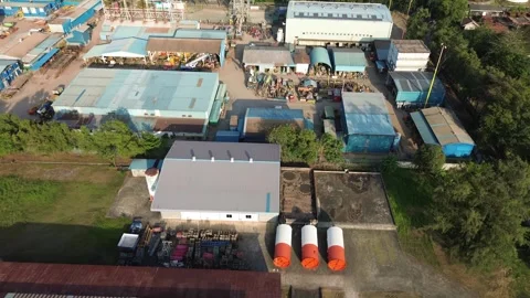 Expansive Drone Perspective Capturing an Operational Manufacturing Plant an.. Stock-Footage 339040423