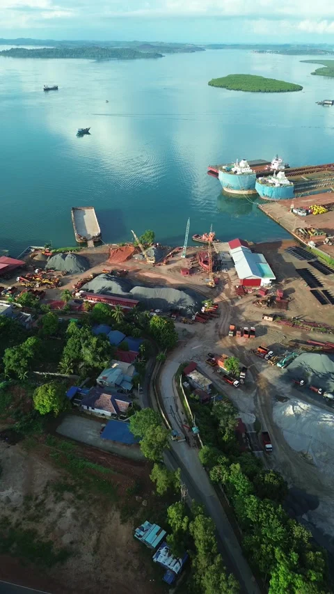 Expansive drone view reveals a vibrant nautical engineering and global trad.. Stock Footage 337282894