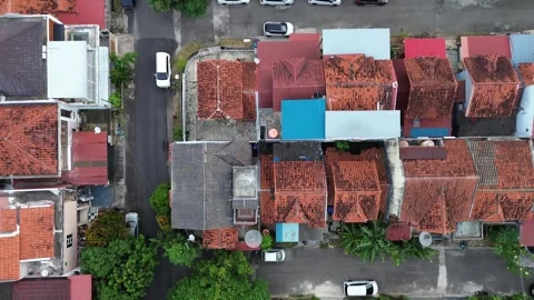 Expansive Drone Vista Revealing a Dynamic Tapestry of Residential Rooftops,.. Video stock 339035844