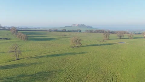 Expansive green fields and rolling hills in the rural countryside of Nievre Stock Footage 346722112