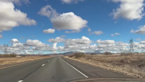 Expansive Highway Under Blue Sky Stock Footage 276192771