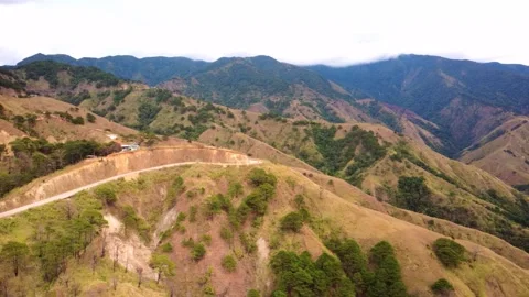 Expansive Mountain Panorama with Winding Road in the Philippines Stock Footage 337784139