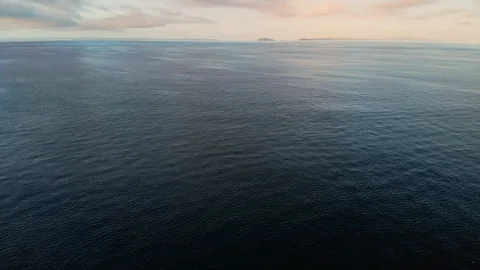 Expansive ocean aerial view with small islands in the distance Stock Footage 113014138