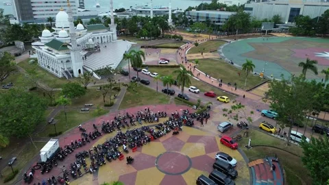 Expansive overhead view of a lively city hub, integrating spiritual archite.. Video stock 339037062