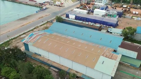 Expansive overhead view of a vibrant portside manufacturing and distributio.. Stock-Footage 339035847