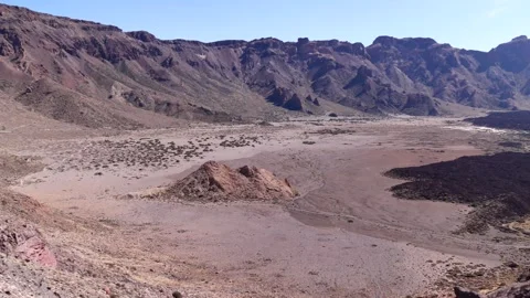 Expansive panoramic view of dramatic lava fields and towering volcanic rock Stock Footage 317638860