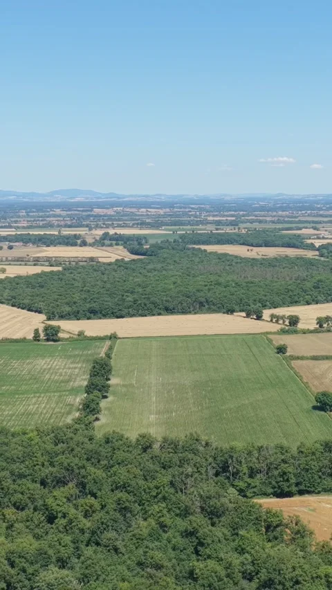 Expansive patchwork fields and farmland in the rural countryside of Nievre Stock Footage 346657583