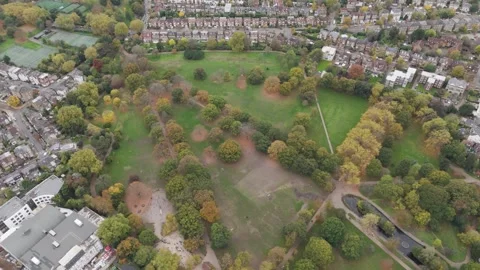 Expansive pull-out view revealing Walpole Park's verdant landscape and Stock-Footage 292984344