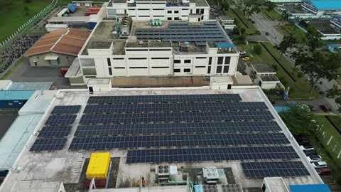 Expansive Rooftop Solar Array Powers Industrial Hub with Sustainable Photov.. Video stock 335126894