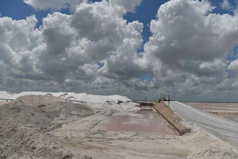 Expansive salt flat landscape under stormy clouds Stock Photos