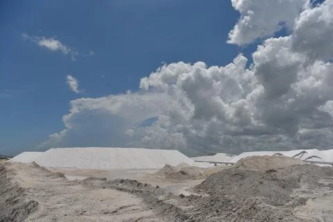 Expansive salt flat landscape under stormy clouds Stock Photos