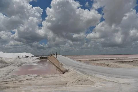 Expansive salt flat landscape under stormy clouds Stock Photos