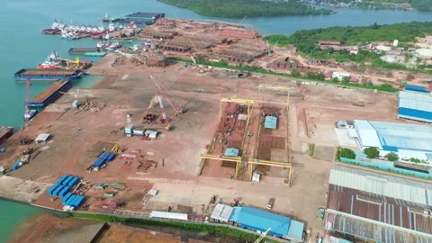 Expansive Shipyard Development: Aerial View of a Thriving Maritime Manufact.. Stock-Footage 325310783