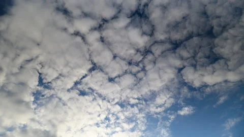 Expansive sky showcasing textured cloud formations and light, Open expansive sky Stock Footage 325637456
