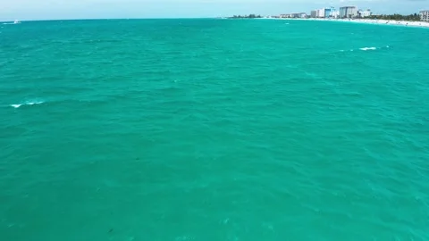 Expansive Teal Ocean Stretching to Distant Coastal Skyline 動画素材 336733174