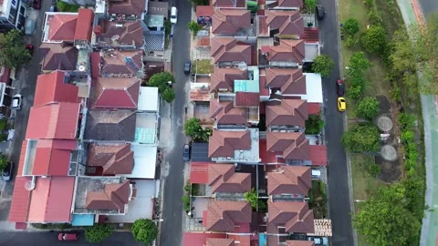Expansive top-down footage of a lively suburban neighborhood featuring terr.. Stock Footage 339033667
