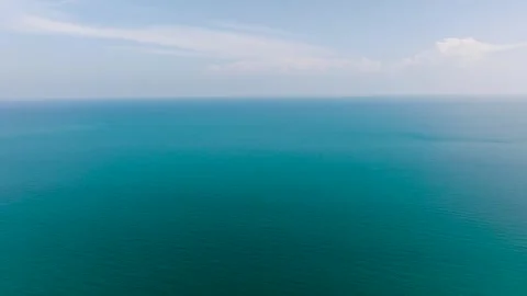 Expansive turquoise ocean under a clear blue sky. Ko Pha Ngan, Thailand. Stock Footage 297050773