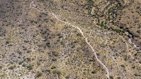 Expansive view of desert mountain hiking biking running trails ascending into Stock Footage 109497327