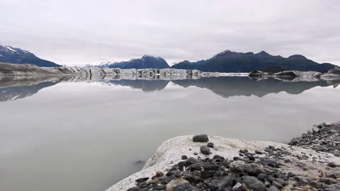 Expansive view of receding glacier creating large meltwater lake Stock Footage 332186831