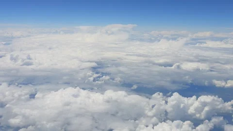 Expansive view of white clouds and blue sky, capturing the vastness of the .. Stock Footage 293123587