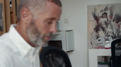 Expat businessman using computer at office. Stock Footage 64099789