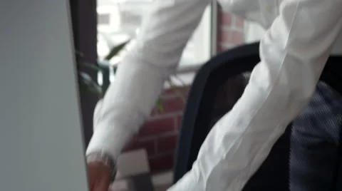 Expat businessman using computer at office. Stock Footage 64099818