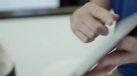 Expat businessman using digital tablet at office. Stock Footage 64102568