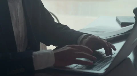 Expat businessman using laptop at cafe Stock Footage 64093764