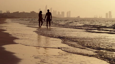 Expat couple walking at beach. Stock Footage 64111702