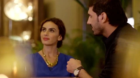 Expat man making payment using credit card at restaurant. Stock Footage 64119410