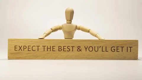 Expect the best You will get it. written on wooden surface. Personal developm Stockfoto's