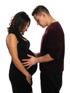Expectant Hispanic Couple Stock Photos