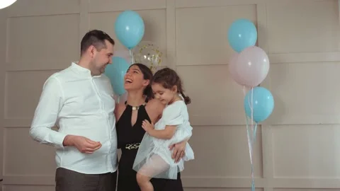 Expectant parents are having a gender reveal party.Slow motion. Stock Footage 182895604