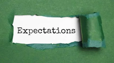 Expectations. text on white paper over torn paper background. Stock Photos