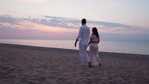 Expecting Baby Walking by Sunset Ocean Waves Stock Footage 301922597