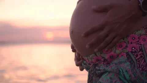 Expecting mother belly at the beach during sunset relaxing Vídeos de archivo 249461492