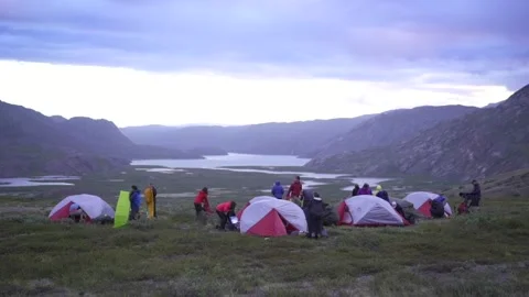 Expedition camp overlooking dramatic mountain valley Stock Footage 344212776