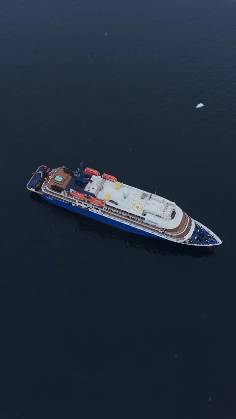 Expedition cruise ship navigating through icy polar waters Stock Footage 322004116